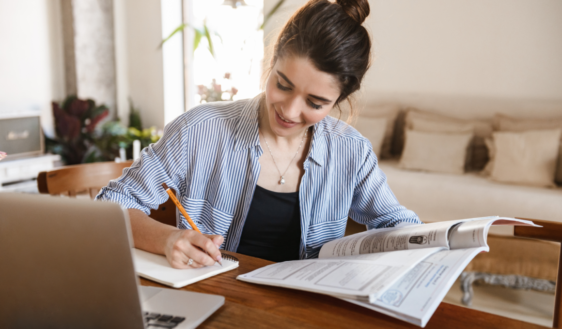 women studying with a laptop and notebook